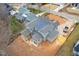 New construction home featuring gray shingles, black gutters, and proximity to neighboring homes at 1101 Manchester, Raleigh, NC 27609