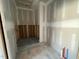 Unfinished bathroom with plumbing in place, and the base of a shower installed at 1101 Manchester, Raleigh, NC 27609