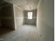 This bedroom features a window that offers natural light and a spacious layout at 1101 Manchester, Raleigh, NC 27609