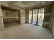 Unfinished living room showcasing large windows that flood the space with natural light at 1101 Manchester, Raleigh, NC 27609