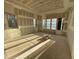 An unfinished living room featuring multiple windows and an open floor plan at 1101 Manchester, Raleigh, NC 27609