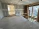 A living room under construction with large windows and a view to the space below at 1101 Manchester, Raleigh, NC 27609