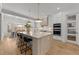 Bright kitchen with large island, stainless appliances, and breakfast nook at 2812 Theresa Eileen Way, Raleigh, NC 27603