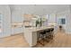 Bright kitchen with large island, white cabinets, and pendant lighting at 2812 Theresa Eileen Way, Raleigh, NC 27603