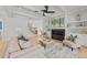 Spacious living room with fireplace, large painting, and staircase in view at 2812 Theresa Eileen Way, Raleigh, NC 27603