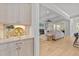 Open concept living room featuring elegant wet bar with seating visible at 2812 Theresa Eileen Way, Raleigh, NC 27603