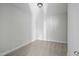A bright bedroom with neutral carpet and a ceiling light at 808 Challenger Ln, Knightdale, NC 27545