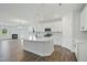 Open-concept kitchen with a large island, stainless steel appliances, and ample counter space at 808 Challenger Ln, Knightdale, NC 27545