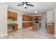 Kitchen with island, wood cabinets, and green countertops at 2200 Becketts Ridge Dr, Hillsborough, NC 27278