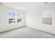 Empty room with carpet, and multiple windows providing lots of natural light at 506 Billingshurst Way, Knightdale, NC 27545