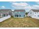 A spacious backyard with a white fence, perfect for outdoor activities and relaxation at 8905 Stratus St, Willow Springs, NC 27592