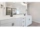 Bright bathroom showcasing double vanity sinks and a large mirror at 1005 Bostonian Dr, Knightdale, NC 27545