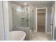 Main bathroom with soaking tub and glass shower at 5008 Trotter Dr, Raleigh, NC 27603