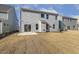 Newly built home with a large backyard and patio at 18 Steppe Way, Garner, NC 27529