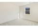 Simple bedroom with carpet and a window at 18 Steppe Way, Garner, NC 27529