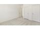 Bright bedroom with carpet flooring and double closets at 18 Steppe Way, Garner, NC 27529