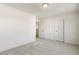 Light and airy bedroom with neutral colored walls and carpet flooring at 18 Steppe Way, Garner, NC 27529