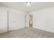 Spacious bedroom with plush carpeting and neutral wall tones at 18 Steppe Way, Garner, NC 27529