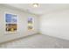 Well-lit bedroom featuring neutral walls and carpet floors at 18 Steppe Way, Garner, NC 27529