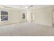 Bright bedroom featuring carpet, ceiling fan and access to bathroom at 18 Steppe Way, Garner, NC 27529