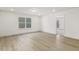 Bonus room with hardwood floors and access to back patio at 18 Steppe Way, Garner, NC 27529