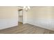 Formal dining room with hardwood floors and access to kitchen at 18 Steppe Way, Garner, NC 27529