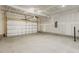 Unfinished garage with overhead door at 18 Steppe Way, Garner, NC 27529