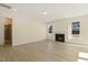 Spacious living room featuring a fireplace and hardwood floors at 18 Steppe Way, Garner, NC 27529