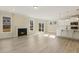 Open living space with fireplace and kitchen view at 18 Steppe Way, Garner, NC 27529