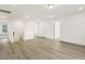 Upstairs hallway with hardwood floors and access to bedrooms at 18 Steppe Way, Garner, NC 27529