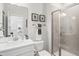 Bright bathroom featuring a tiled shower and vanity at 367 W Amber Oak Dr # 53, Selma, NC 27576