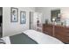 Neutral-toned bedroom with dresser, and soft decor at 367 W Amber Oak Dr # 53, Selma, NC 27576