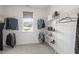 Large walk-in closet with ample shelving and a window for natural light at 367 W Amber Oak Dr # 53, Selma, NC 27576
