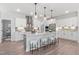 Stylish kitchen with white cabinets, stainless steel appliances, and a center island at 367 W Amber Oak Dr # 53, Selma, NC 27576