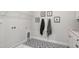 Laundry room with patterned floors, plenty of wall space, and utility sink at 367 W Amber Oak Dr # 53, Selma, NC 27576