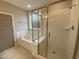 Bathroom featuring a tub/shower combo with glass door at 399 W Amber Oak Dr # 52, Selma, NC 27576
