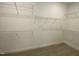 Walk-in closet with installed shelving awaiting your personal organization at 399 W Amber Oak Dr # 52, Selma, NC 27576