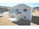 Home with a spacious backyard and covered patio area that offers a comfortable space for outdoor activities and entertaining at 135 Newport Lndg, Garner, NC 27529