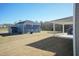 Expansive backyard with a covered patio, perfect for outdoor gatherings and enjoying the serene surroundings at 135 Newport Lndg, Garner, NC 27529