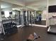 Community gym with various weight training and cardio equipment at 135 Newport Lndg, Garner, NC 27529