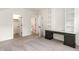 Bedroom featuring a desk area and built in shelving for ample storage at 14020 Durant Rd, Raleigh, NC 27614
