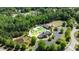 Community pool with clubhouse, playground, ample parking, and mature trees in a beautiful natural setting at 100 N Ridge View Way, Franklinton, NC 27525