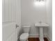 Powder room with pedestal sink and fixtures at 100 N Ridge View Way, Franklinton, NC 27525