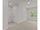 Bright bedroom with a window and standard closet with double doors at 100 N Ridge View Way, Franklinton, NC 27525