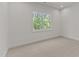 Neutral carpeted bedroom with natural light from window and white trim at 100 N Ridge View Way, Franklinton, NC 27525