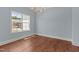 Bright dining room with a chandelier, light blue paint and white trim at 100 N Ridge View Way, Franklinton, NC 27525