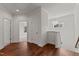 Hallway features hardwood floors, natural light, and leads to a bedroom at 100 N Ridge View Way, Franklinton, NC 27525