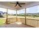 Relaxing screened porch with wood flooring and scenic backyard view at 5828 Genesee Dr., Homesite 9, Durham, NC 27712
