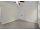 Well-lit bedroom with neutral walls, carpeted floors and a double door closet providing ample storage at 225 Whistlers Cv, Louisburg, NC 27549