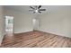 Large main bedroom with a ceiling fan and an ensuite bathroom at 225 Whistlers Cv, Louisburg, NC 27549